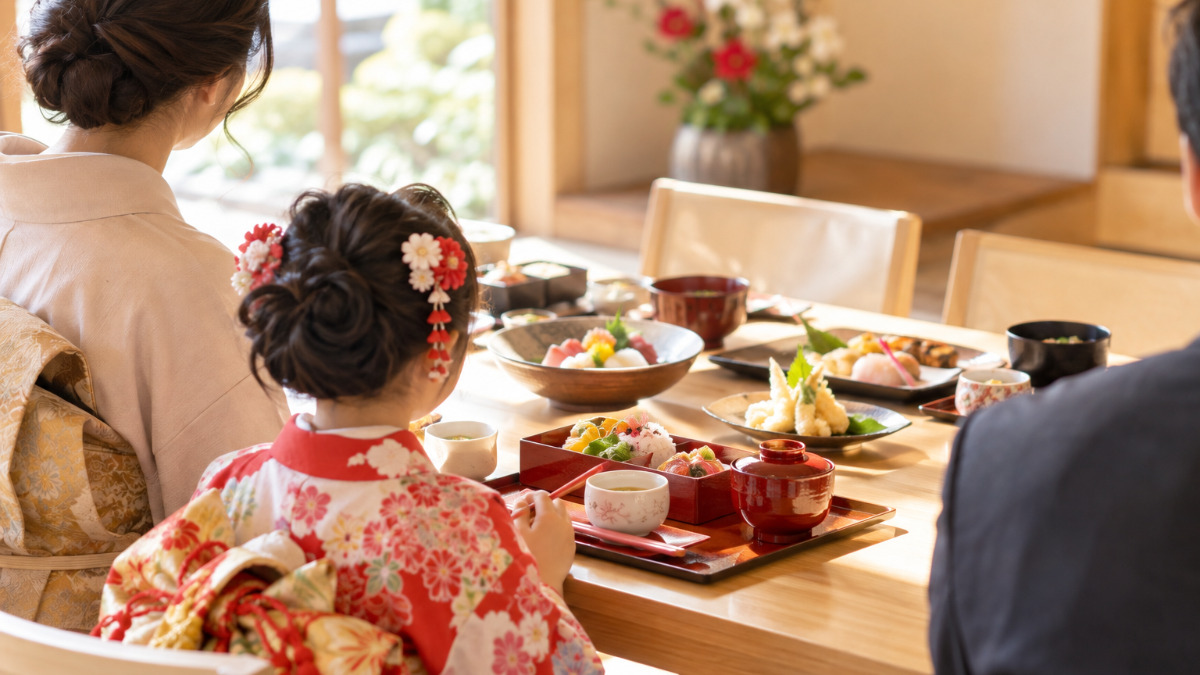 七五三のお祝いの食事を囲む家族